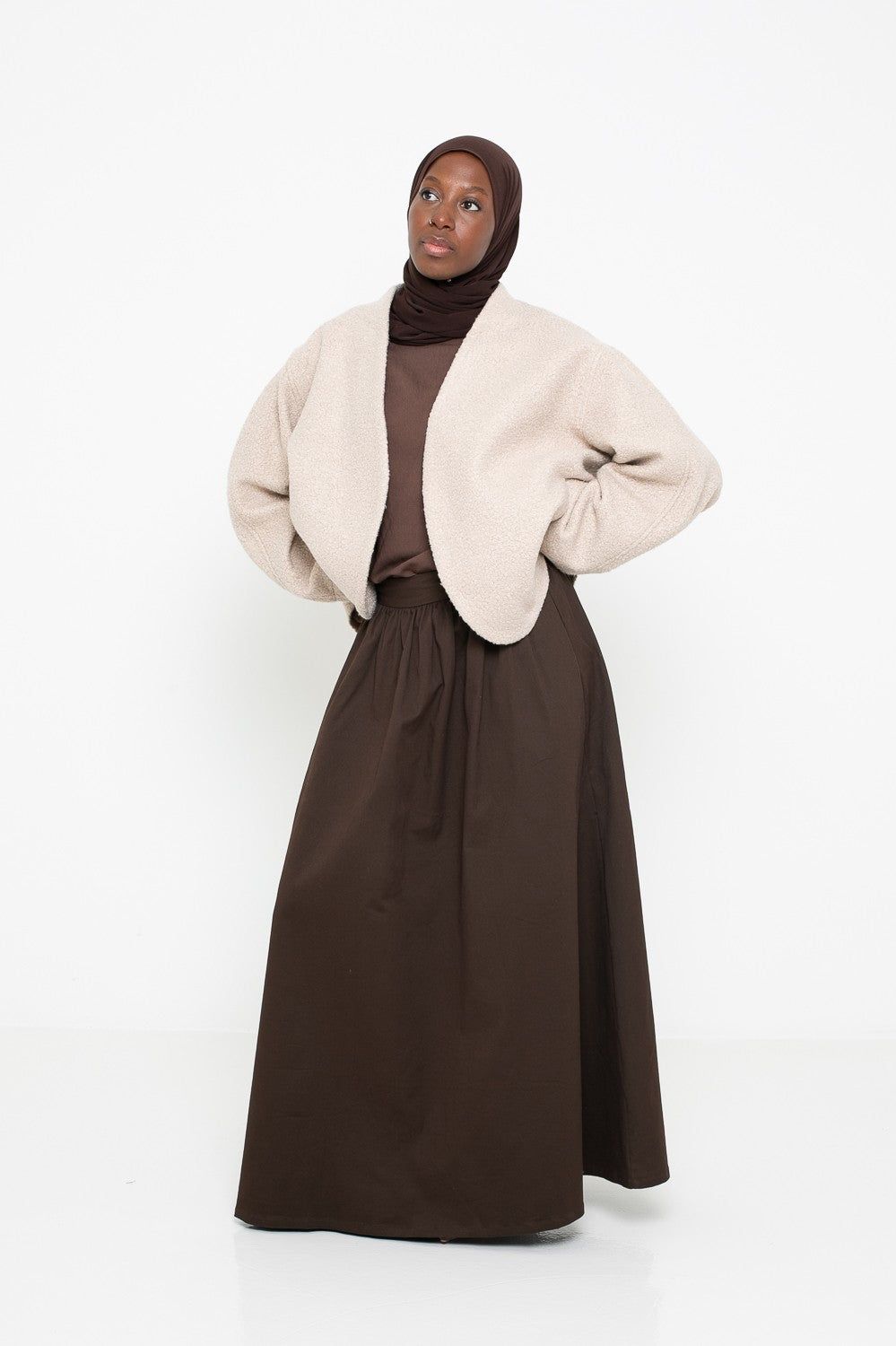Veste en laine bouclée beige coupe ample. Boutique musulmane.