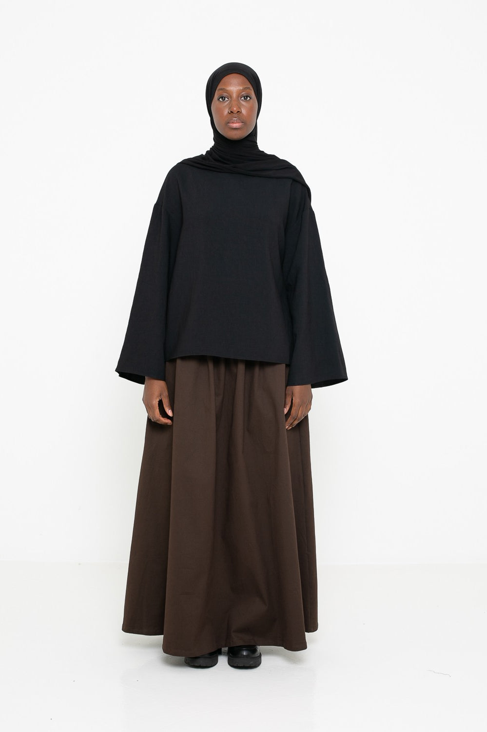 Haut simple noir ample pour femme musulmane