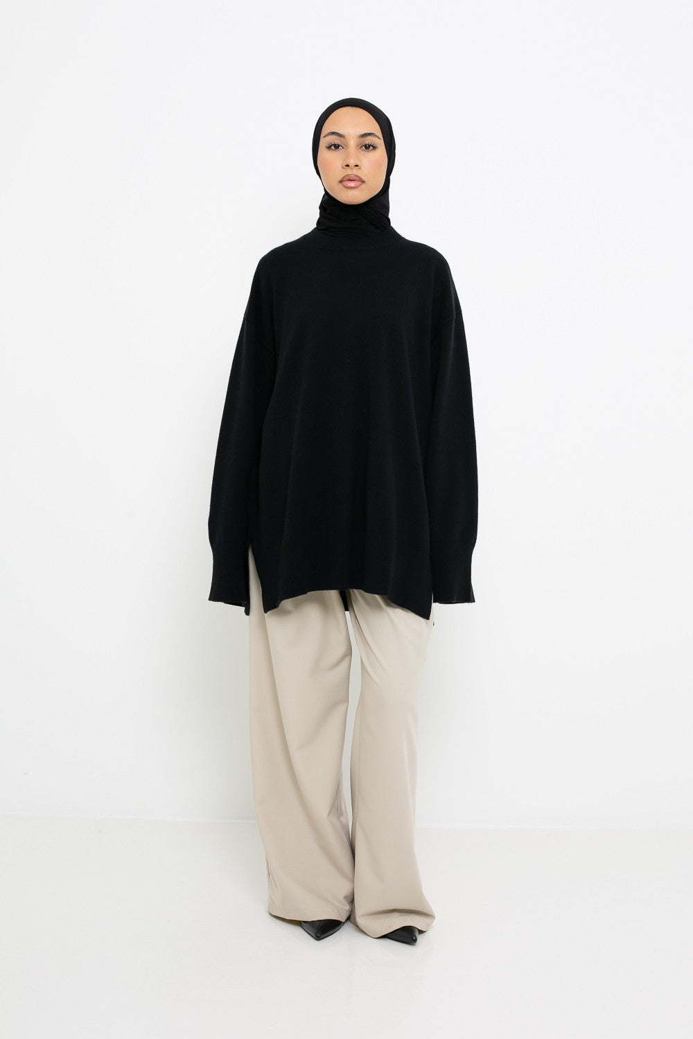 Pull ample en maille à manche large noir pour femme modeste.