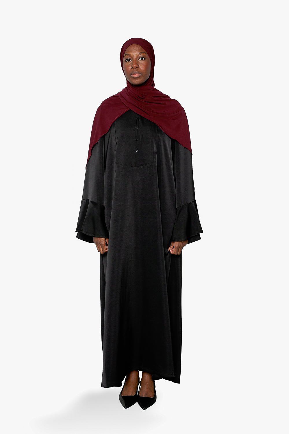 Robe ample à manche large avec bouton pour femme musulmane. Boutique hijab moderne.