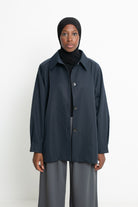 Trench minimaliste pour femme.