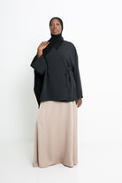 Jupe satinée évasée beige. Boutique femme modeste et moderne