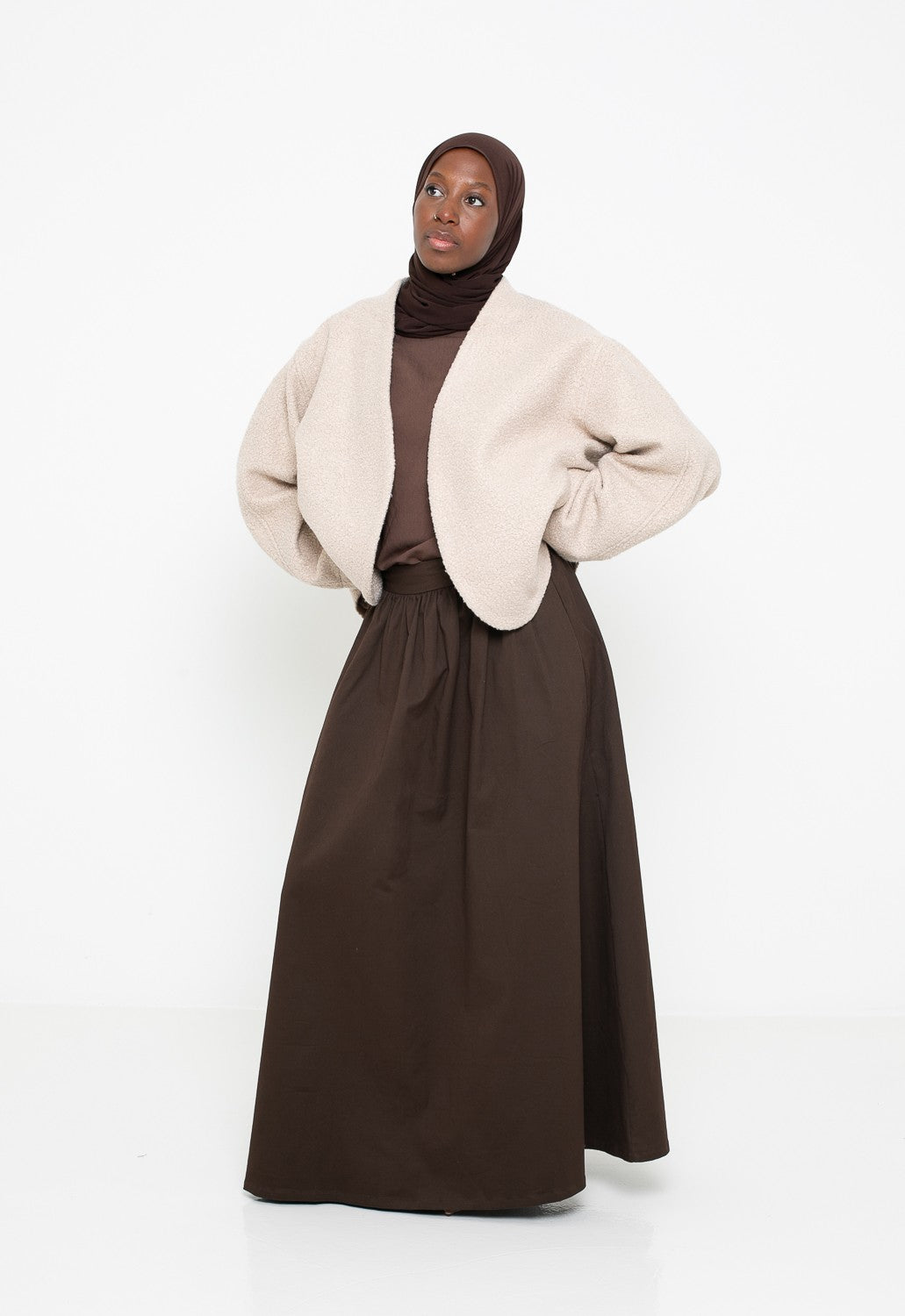 Veste en laine bouclée beige coupe ample. Boutique musulmane.