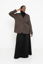 Veste tailleur marron foncé de qualité supérieur pour femme voilée chic et classe.