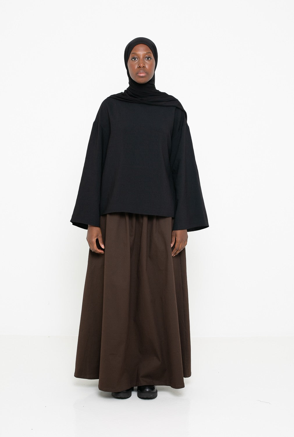 Haut simple noir ample pour femme musulmane