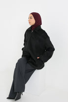 Manteau veste en laine noir détails poche. Boutique prêt à porter pour femme musulmane