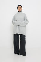 Pull long en laine gris clair manche large pour femme musulmane. Boutique marque modeste fashion.