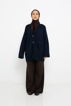 Gilet cardigan à poche pour femme musulmane. Boutique de prêt à porter.