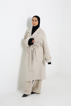 Manteau long chic en laine de qualité pour femme musulmane.