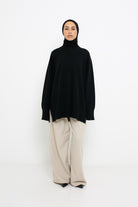 Pull ample en maille à manche large noir pour femme modeste.